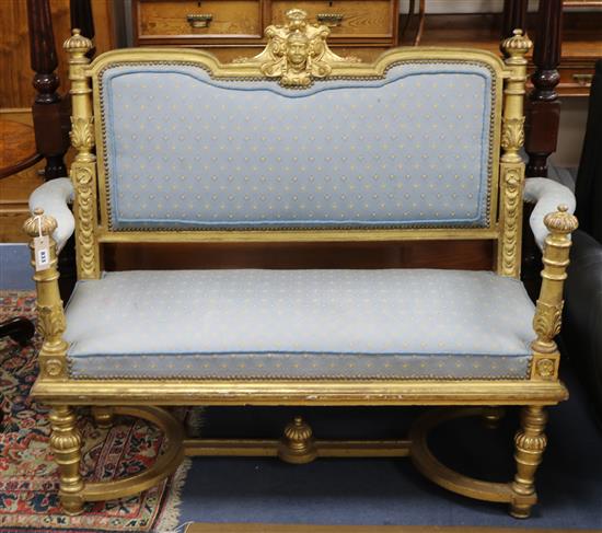 A late 19th century French carved and giltwood canape W.130cm